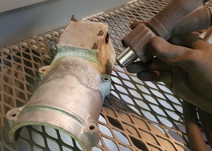Vapour Bead Blasting old car part
