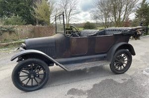 Old rusty Maxwell car in for restoration